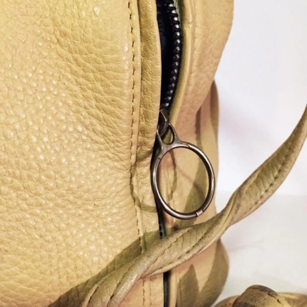 Genuine leather cream color handmade backpack sling bag drawstring vintage